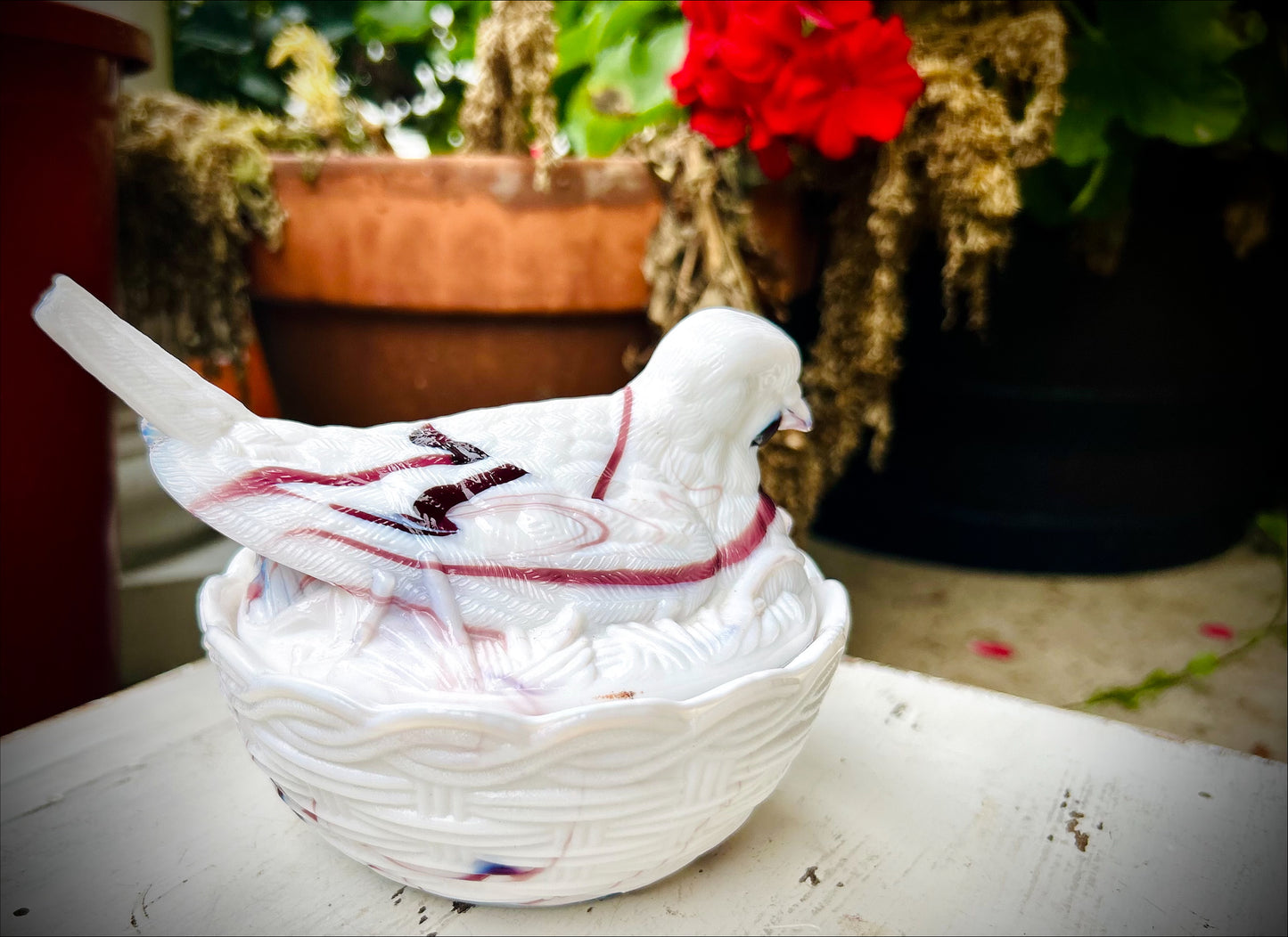 Collectible Vintage Milk Glass Slag Glass Bird on Nest- White with Purple Swirls.