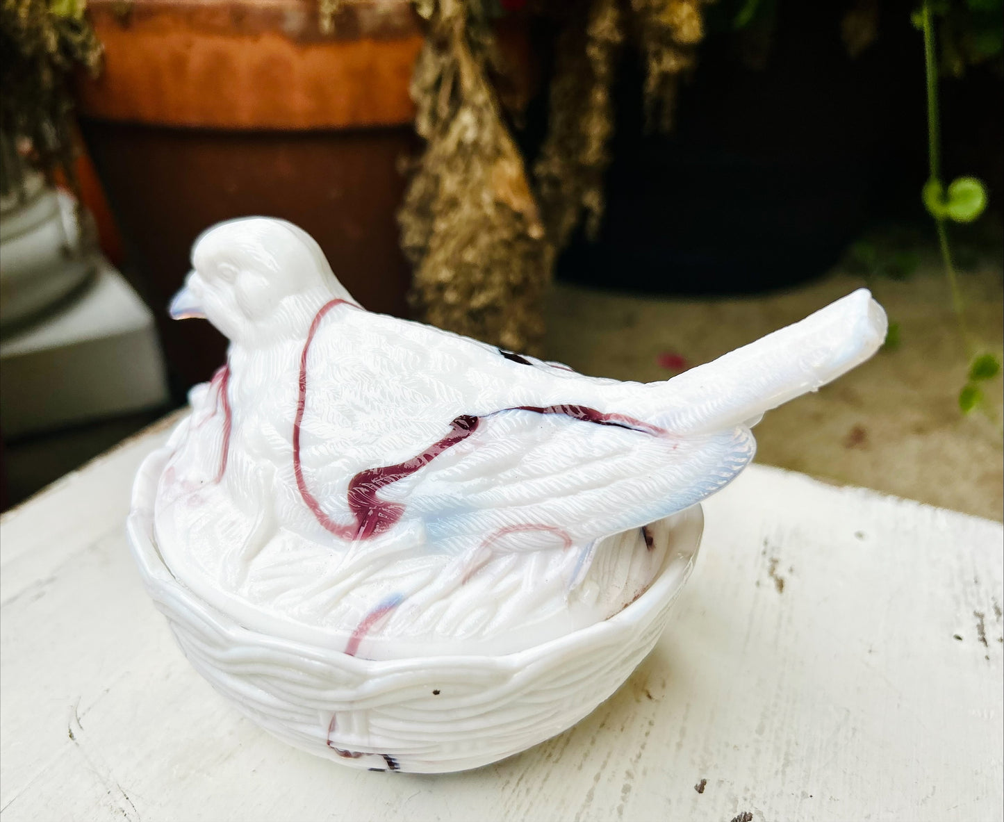 Collectible Vintage Milk Glass Slag Glass Bird on Nest- White with Purple Swirls.