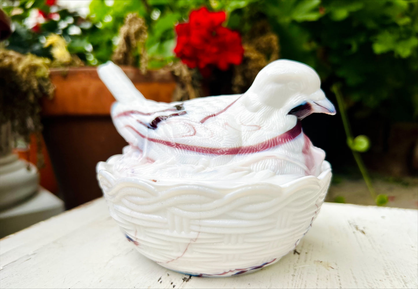 Collectible Vintage Milk Glass Slag Glass Bird on Nest- White with Purple Swirls.
